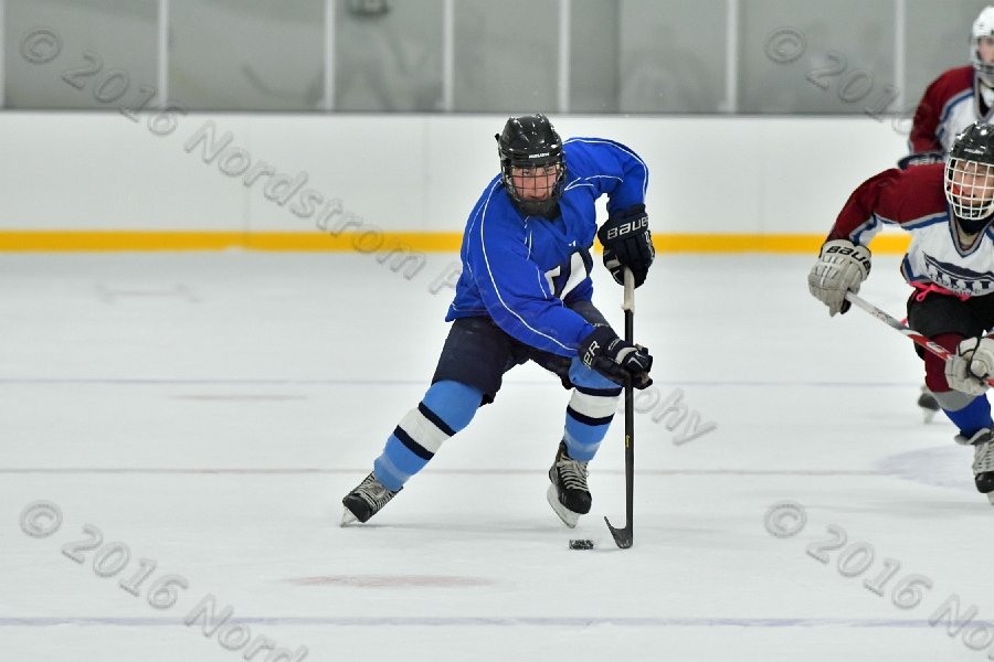 Wheaton College Men\'s Ice Hockey vs Middlesex Community College. - Photo By: KEITH NORDSTROM